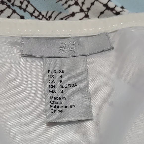 H&M jumpsuit, blue and brown leaf print, cropped length, convertible straps - Picture 8 of 16